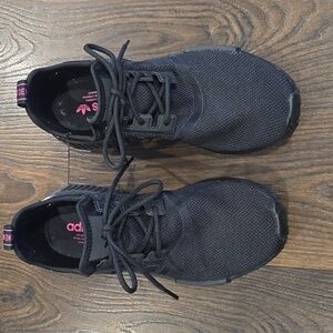 Women's size 8.5 Adidas NMD in like new condition.
